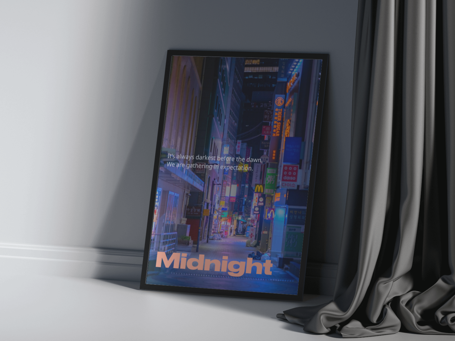 A poster sitting in a frame next to a curtain.